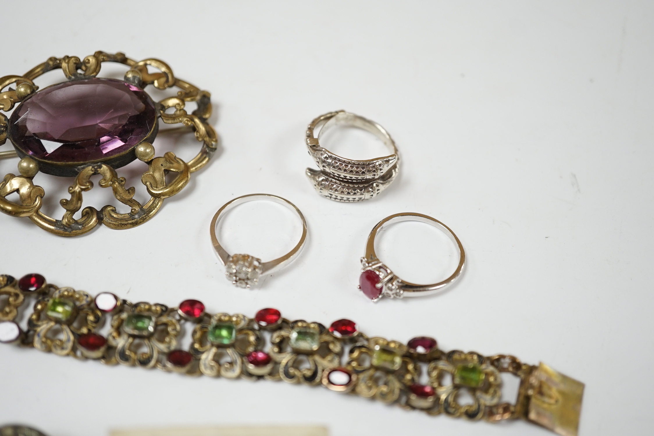 A small pair of diamond stud earrings, two 9ct white gold and gem set rings including diamond cluster and sundry other jewellery including An Austro-Hungarian style bracelet.